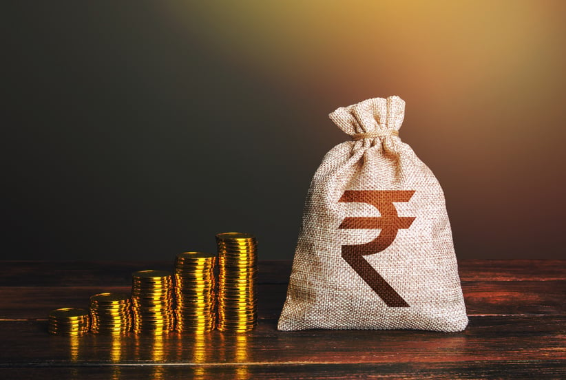 Indian rupee money bag and increasing stacks of coins. Rise in profits, budget fees. Investments. Raise incomes, increase salaries. Financial success. Economic growth, GDP. Savings and accumulation.